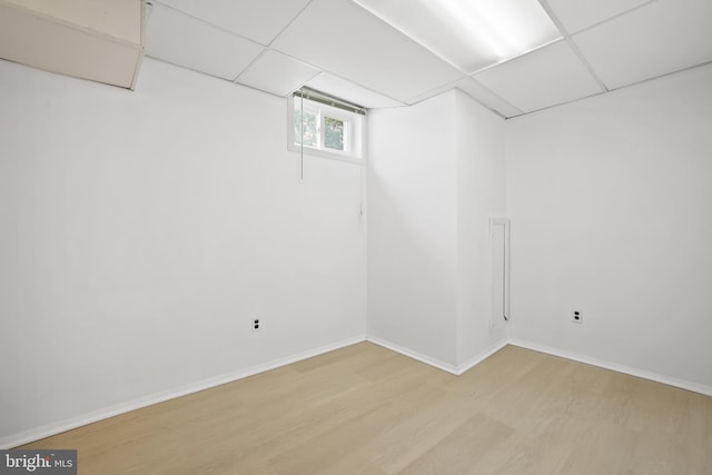 13412 Glen Taylor Ln, Herndon, VA 20171 - below grade area featuring light wood-type flooring and a paneled ceiling