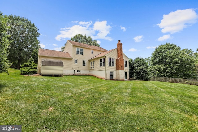13412 Glen Taylor Ln, Herndon, VA 20171 - rear view of property featuring a chimney