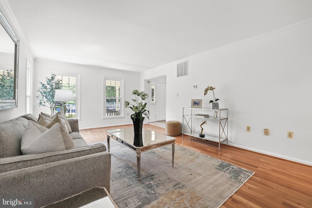 13412 Glen Taylor Ln, Herndon, VA 20171 - living room featuring wood finished floors and ornamental molding
