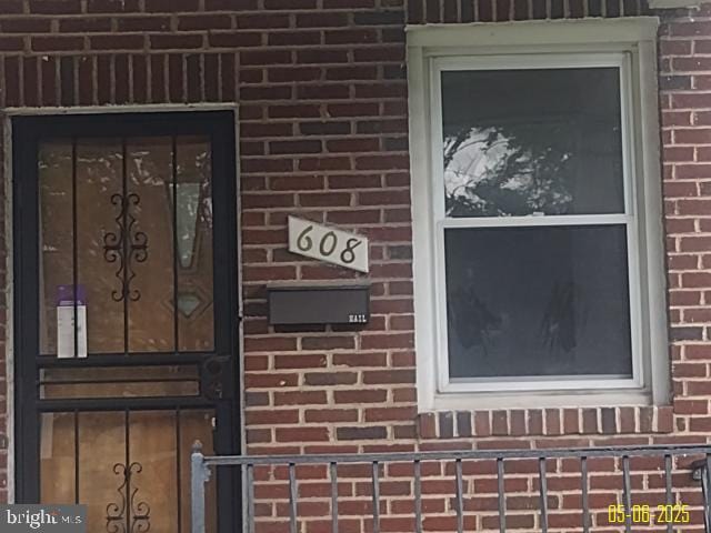 608 Chestnut Hill Ave, Baltimore, MD 21218 - exterior view of brick siding