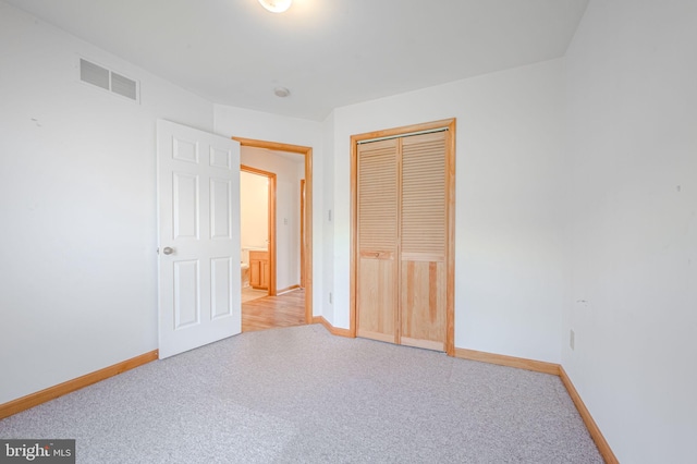 6 Windsor Ct, Elkton, MD 21921 - unfurnished bedroom featuring light colored carpet, baseboards, and a closet