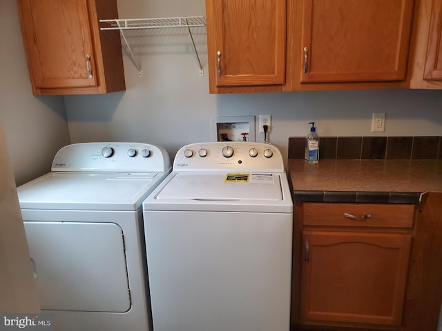113 Beech Tree Ln, Harrington, DE 19952 - washroom featuring washing machine and dryer and cabinet space