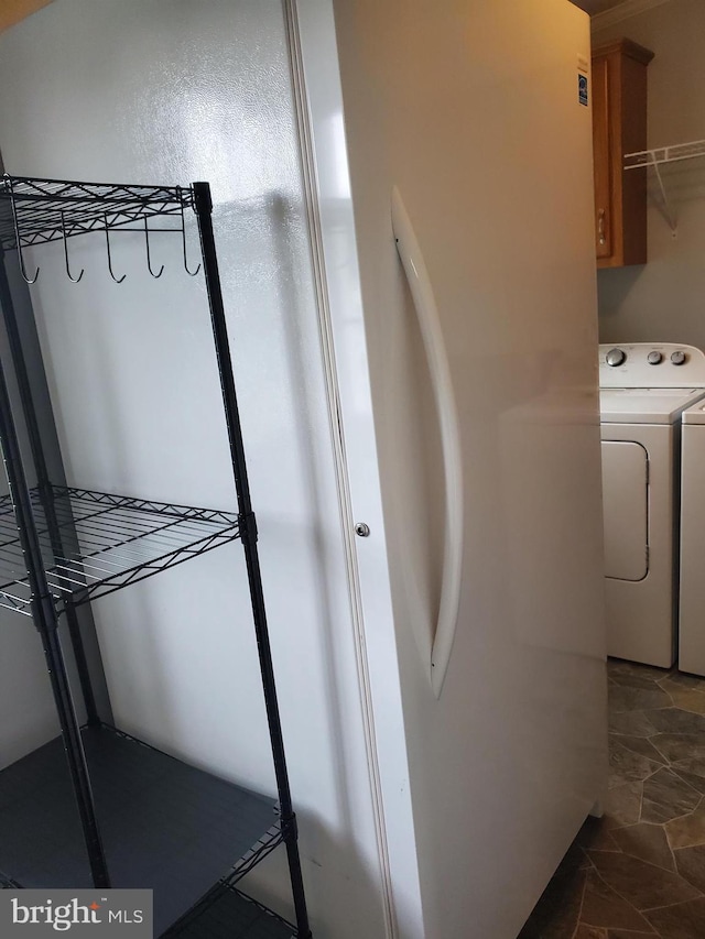 113 Beech Tree Ln, Harrington, DE 19952 - washroom with cabinet space and washer and clothes dryer
