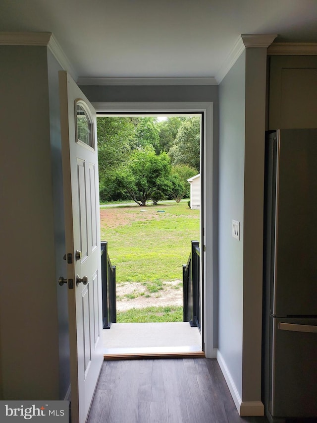 113 Beech Tree Ln, Harrington, DE 19952 - doorway to outside featuring wood finished floors, baseboards, and ornamental molding