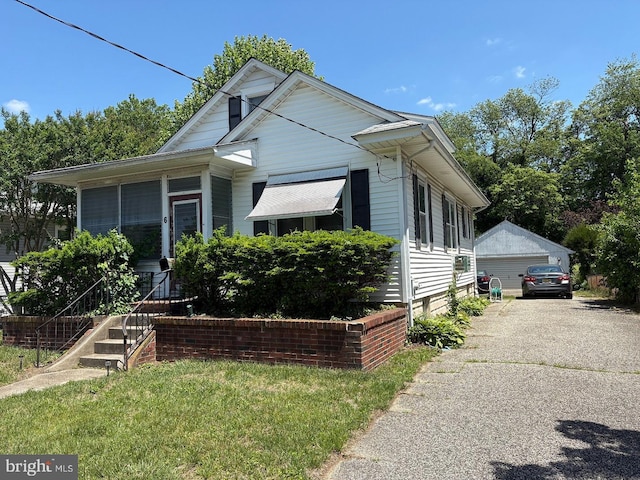 6 Malan Ave, Berlin, NJ 08009 - shotgun-style home with an outdoor structure and a garage
