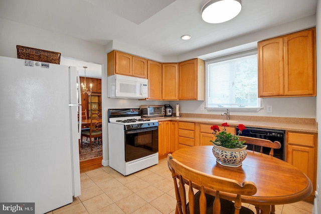 742 Arndt Ave, Riverside, NJ 08075 - kitchen with white appliances, a sink, light tile patterned floors, light countertops, and recessed lighting