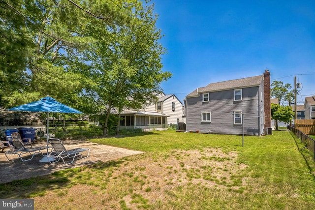 742 Arndt Ave, Riverside, NJ 08075 - view of yard with central AC, a sunroom, and a patio