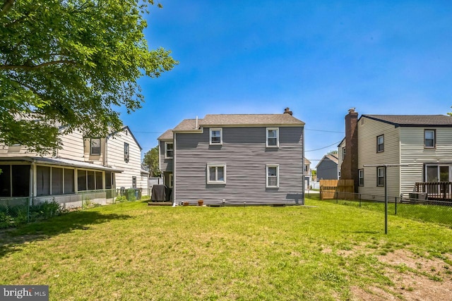 742 Arndt Ave, Riverside, NJ 08075 - rear view of property with a sunroom and a chimney