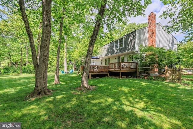 6316 Ferryboat Cir, Columbia, MD 21044 - back of house with a wooden deck and a chimney