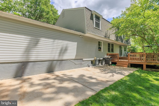 6316 Ferryboat Cir, Columbia, MD 21044 - rear view of property with a patio area, a deck, and a yard