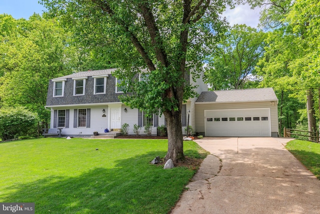 6316 Ferryboat Cir, Columbia, MD 21044 - view of front of house featuring driveway, a shingled roof, and an attached garage
