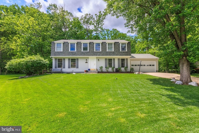 6316 Ferryboat Cir, Columbia, MD 21044 - view of front of property featuring an attached garage, driveway, a front yard, and a shingled roof