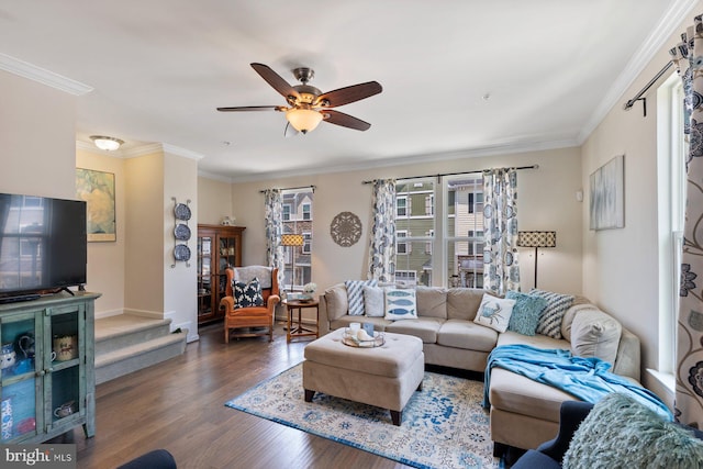 8109 Secluded Cove Ln, Dundalk, MD 21222 - living area featuring wood finished floors, ornamental molding, ceiling fan, baseboards, and stairs