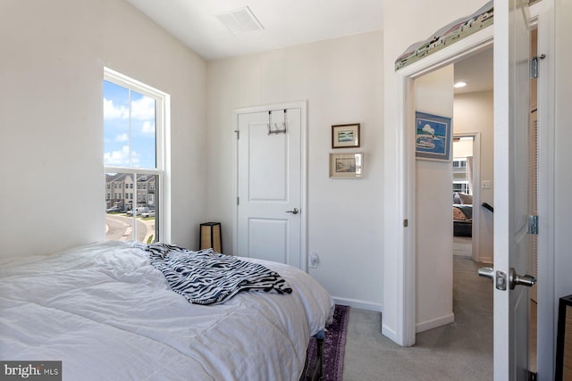 8109 Secluded Cove Ln, Dundalk, MD 21222 - carpeted bedroom with baseboards