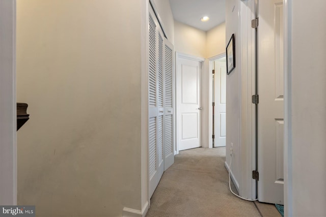 8109 Secluded Cove Ln, Dundalk, MD 21222 - hallway with light carpet, baseboards, and recessed lighting