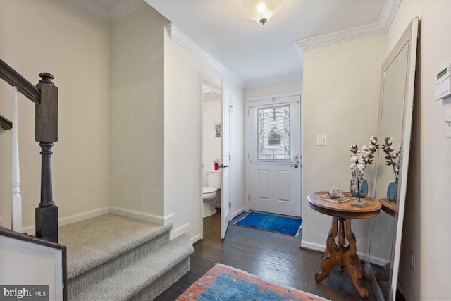 8109 Secluded Cove Ln, Dundalk, MD 21222 - foyer entrance with dark wood-style floors, stairway, baseboards, and crown molding