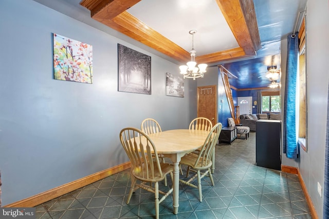 133 W Norris St, Philadelphia, PA 19122 - dining room featuring a chandelier, baseboards, and tile patterned floors