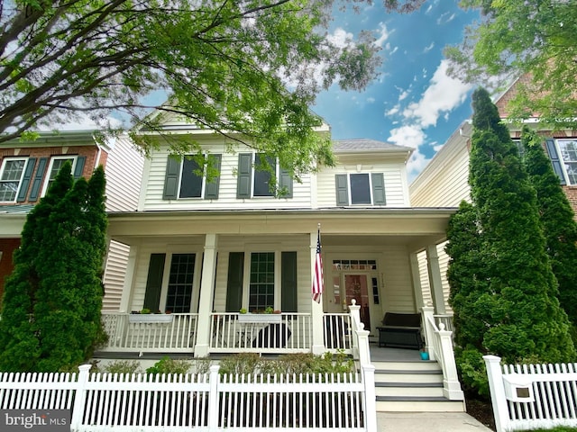713 Bright Meadow Dr, Gaithersburg, MD 20878 - view of front of property with covered porch and a fenced front yard
