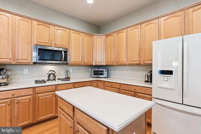 713 Bright Meadow Dr, Gaithersburg, MD 20878 - kitchen with white appliances, recessed lighting, light countertops, and light brown cabinets