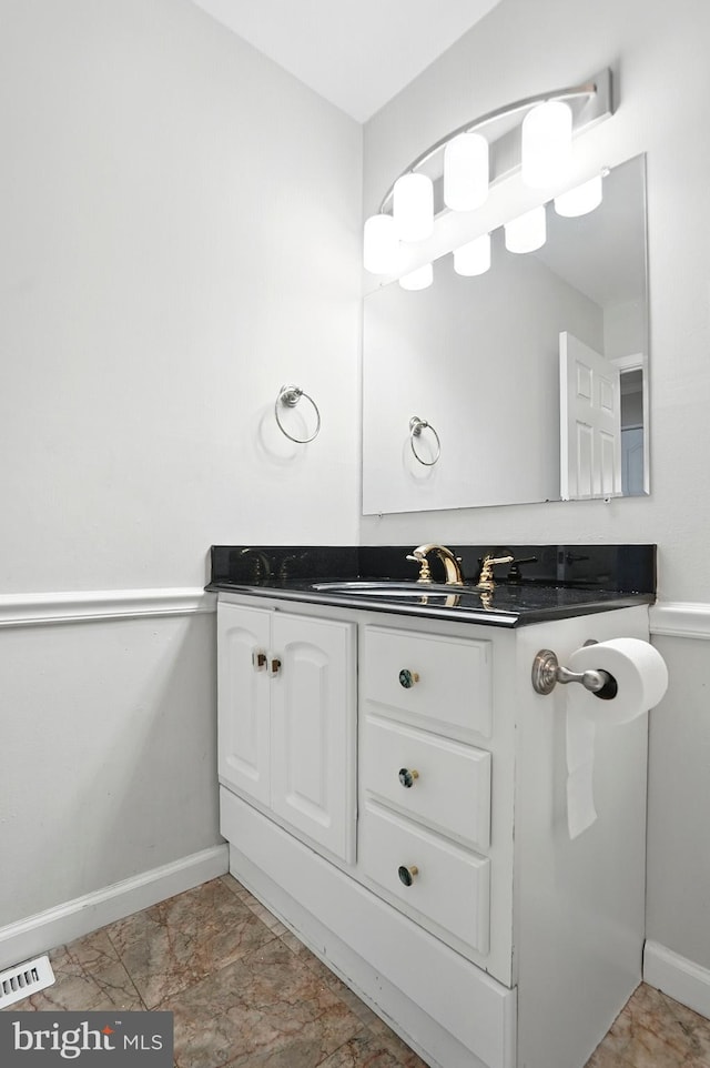 2512 Kitmore Ln, Bowie, MD 20715 - bathroom with baseboards and vanity