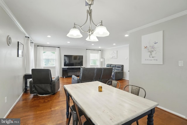 2512 Kitmore Ln, Bowie, MD 20715 - dining area featuring a chandelier, ornamental molding, plenty of natural light, wood finished floors, and recessed lighting
