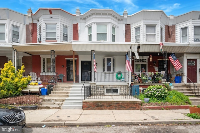520 S Conestoga St, Philadelphia, PA 19143 - townhome / multi-family property featuring covered porch