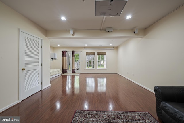 10745 Hillingdon Rd, Woodstock, MD 21163 - unfurnished living room with wood finished floors, baseboards, and recessed lighting