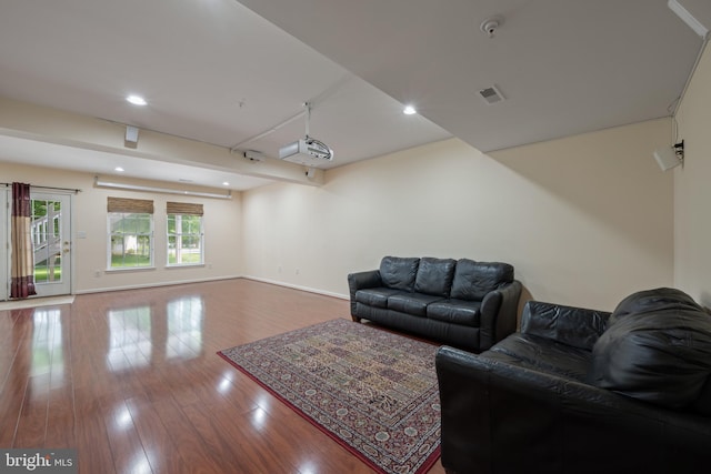 10745 Hillingdon Rd, Woodstock, MD 21163 - living area featuring wood finished floors, baseboards, and recessed lighting