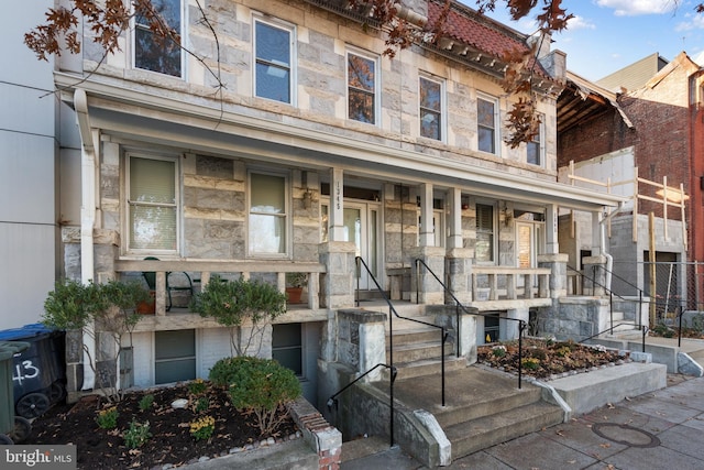 1345 Pennsylvania Ave SE Unit 6, Washington, DC 20003 - view of front of home with a porch and stone siding