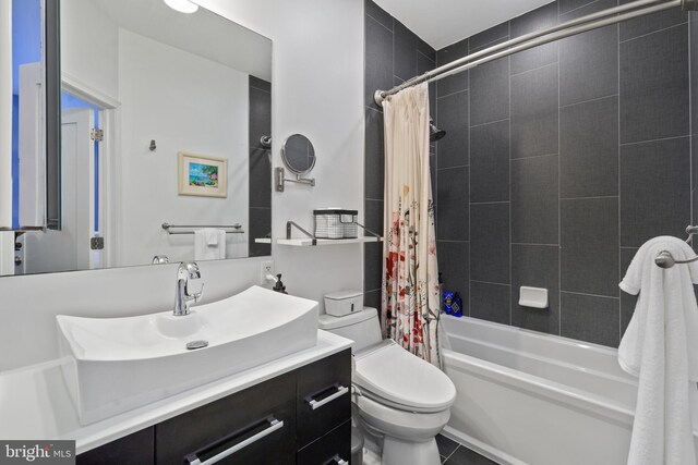 1345 Pennsylvania Ave SE Unit 6, Washington, DC 20003 - full bath featuring vanity, shower / bath combo with shower curtain, and toilet