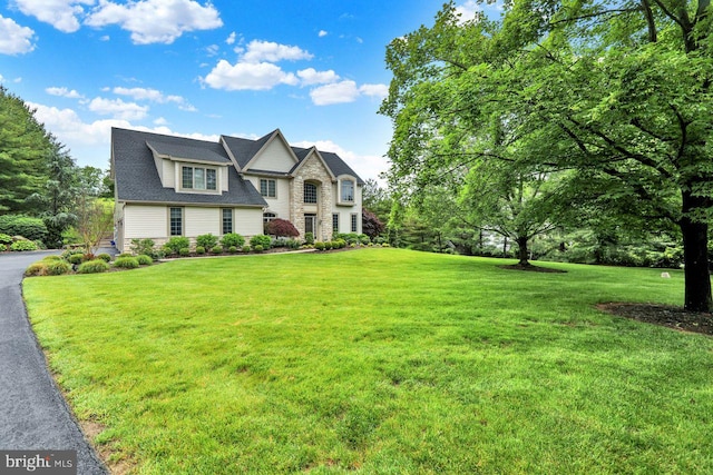 12 Fox Glen Dr, Reading, PA 19608 - view of front facade featuring a front yard and stone siding