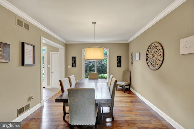 12 Fox Glen Dr, Reading, PA 19608 - dining room with crown molding, dark wood-type flooring, and baseboards