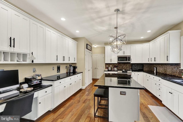 12 Fox Glen Dr, Reading, PA 19608 - kitchen featuring appliances with stainless steel finishes, white cabinetry, decorative backsplash, and recessed lighting