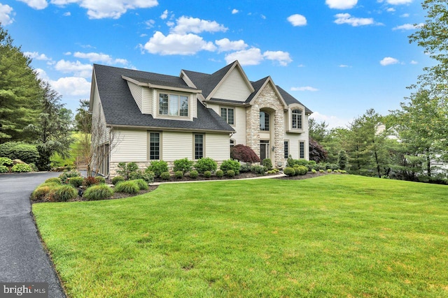 12 Fox Glen Dr, Reading, PA 19608 - view of front facade with stone siding and a front lawn