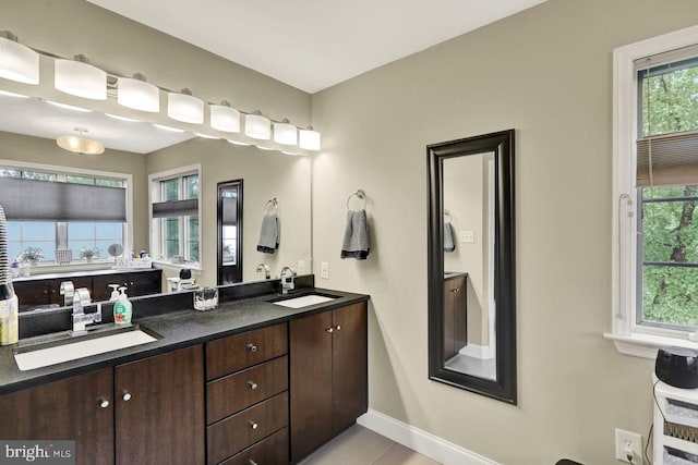 12 Fox Glen Dr, Reading, PA 19608 - full bathroom featuring double vanity and baseboards