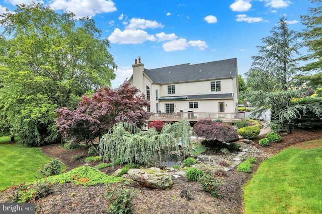 12 Fox Glen Dr, Reading, PA 19608 - rear view of property with a wooden deck, a chimney, and a yard