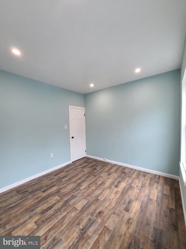 1218 Fidelity St, Reading, PA 19604 - unfurnished room featuring baseboards, dark wood-style flooring, and recessed lighting