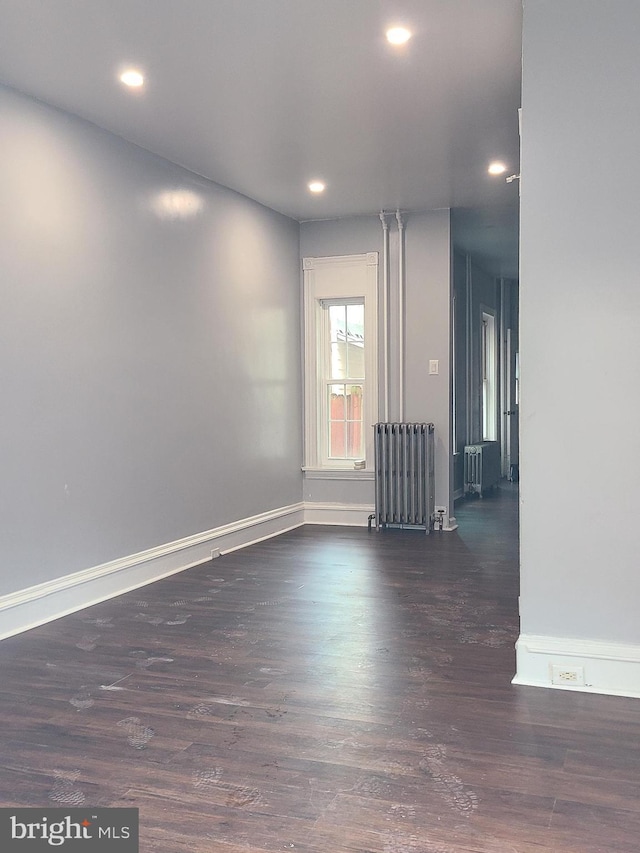 1218 Fidelity St, Reading, PA 19604 - empty room featuring radiator, wood finished floors, recessed lighting, and baseboards