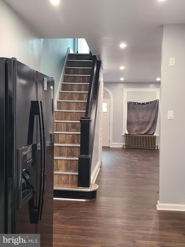 1218 Fidelity St, Reading, PA 19604 - stairs with wood finished floors, baseboards, and recessed lighting