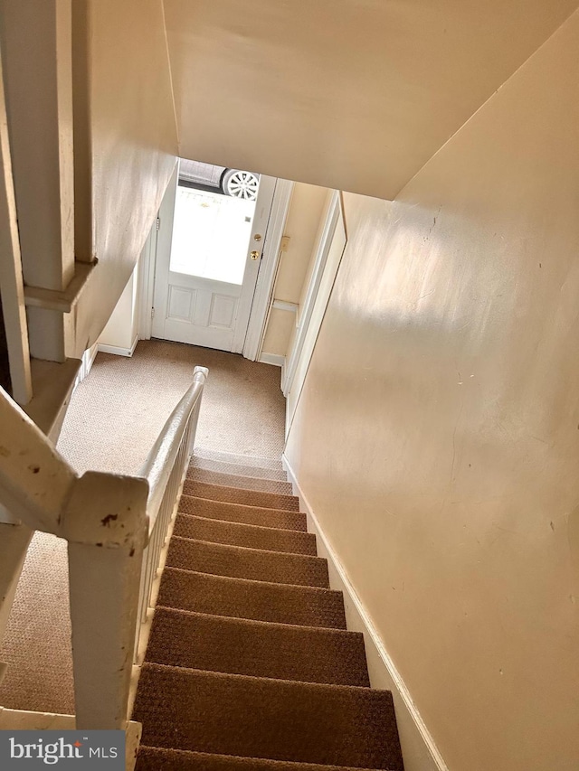 110-112 W Bishop St, Bellefonte, PA 16823 - stairs featuring carpet