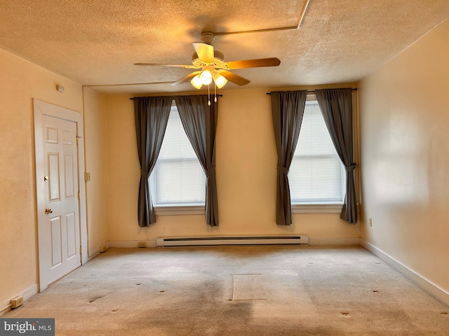 110-112 W Bishop St, Bellefonte, PA 16823 - spare room featuring a baseboard radiator, carpet, ceiling fan, a textured ceiling, and healthy amount of natural light