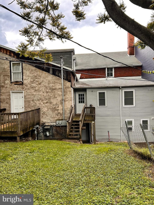 110-112 W Bishop St, Bellefonte, PA 16823 - back of house featuring a deck and a chimney