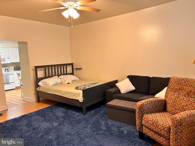 110-112 W Bishop St, Bellefonte, PA 16823 - bedroom with light wood-style flooring and a ceiling fan