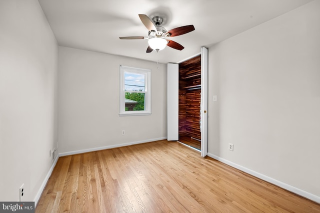 8320 Overmont, Parkville, MD 21234 - unfurnished bedroom with wood finished floors, baseboards, and a closet