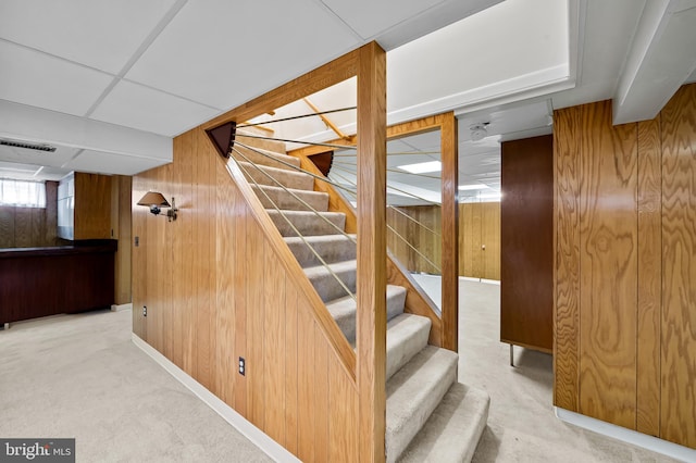 8320 Overmont, Parkville, MD 21234 - stairs featuring carpet flooring and wood walls
