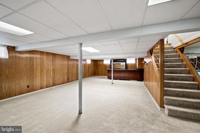 8320 Overmont, Parkville, MD 21234 - basement featuring stairs, carpet floors, and wood walls