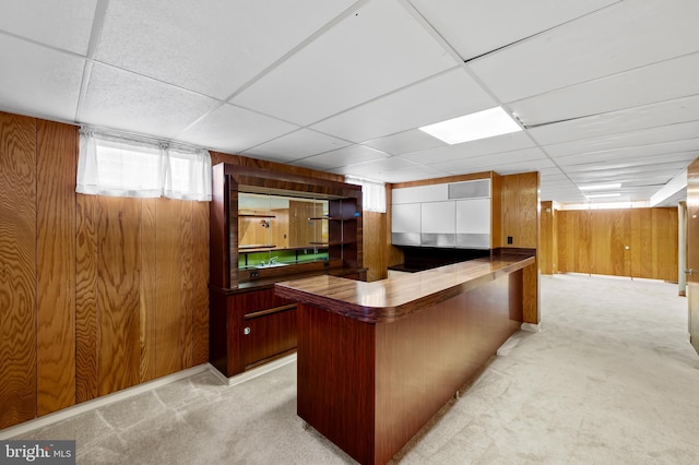 8320 Overmont, Parkville, MD 21234 - bar area with wooden walls, a drop ceiling, light colored carpet, and a sink