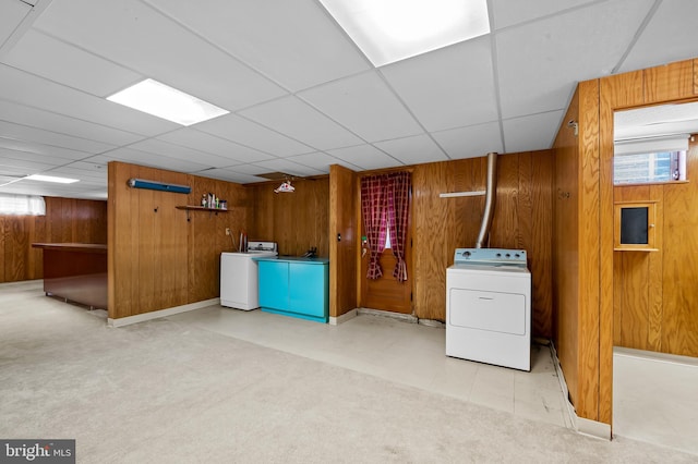 8320 Overmont, Parkville, MD 21234 - below grade area featuring wood walls, washing machine and clothes dryer, and carpet