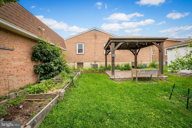 8320 Overmont, Parkville, MD 21234 - view of grassy yard featuring a garden, a gazebo, and cooling unit