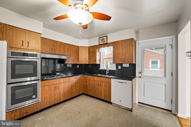 8320 Overmont, Parkville, MD 21234 - kitchen with appliances with stainless steel finishes, a sink, dark countertops, and under cabinet range hood